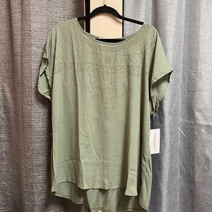 Sleeveless green blouse